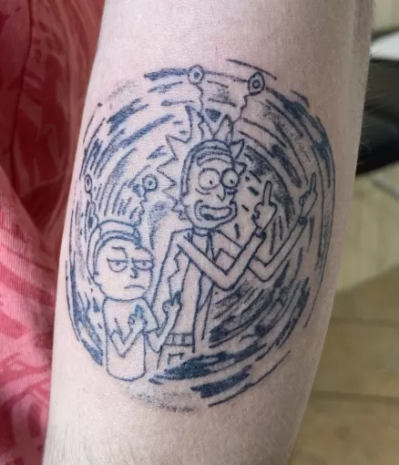 Tatouage d’une série d’animation: Rick and Morty tatoué sur Dax., Dax, L'Encre du Paradis